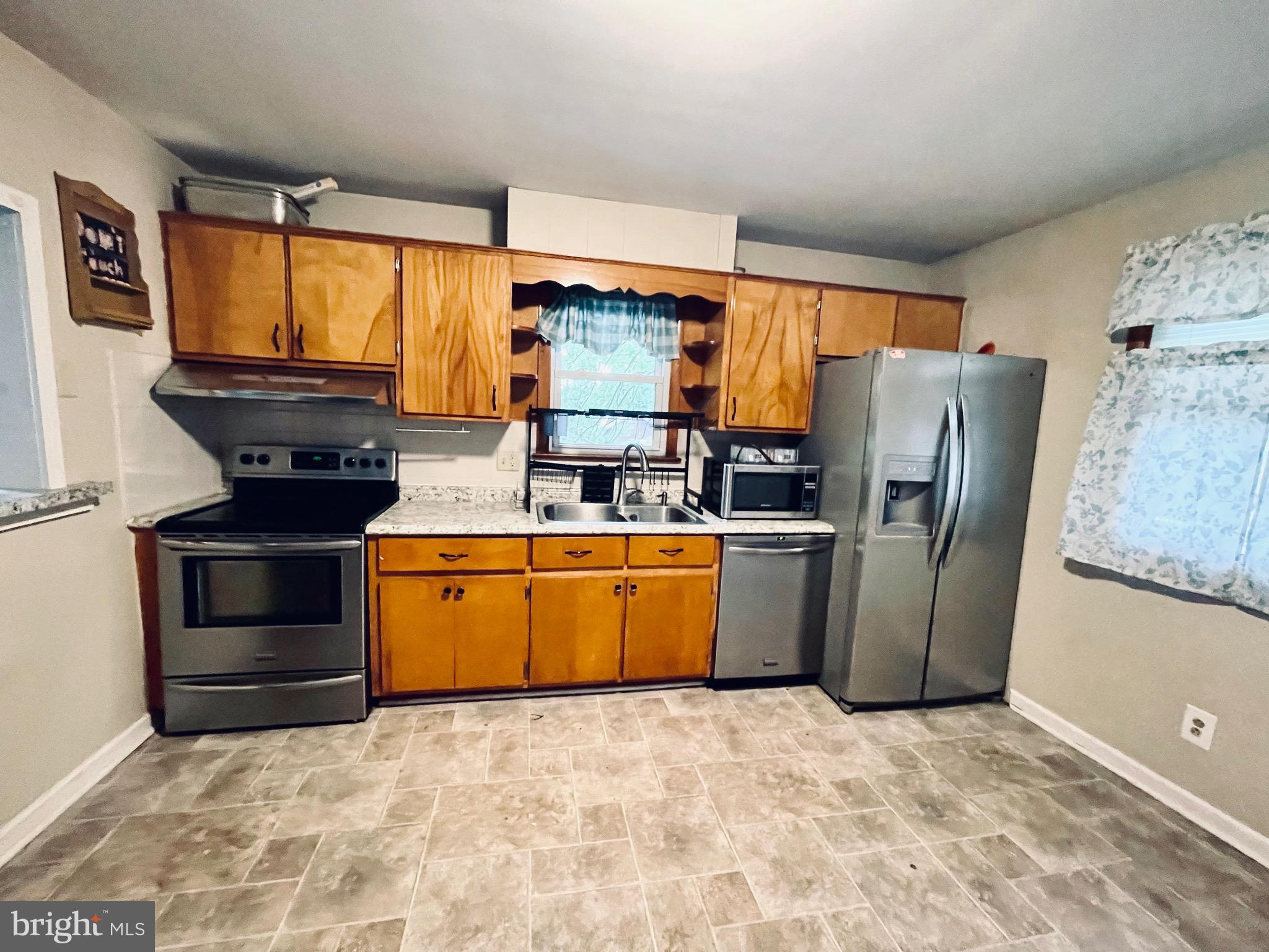 20 Riviera Drive Pennsville, NJ 08070 - Photo 6 of 22 Upstairs Unit: Stainless Steel Appliance Package