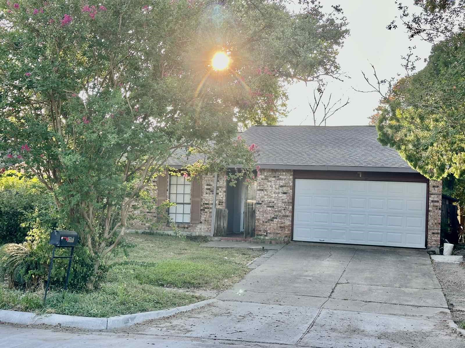 16118 Lazy Ridge Road Houston, TX 77053 - Photo 23 of 23 a front view of a house with garden
