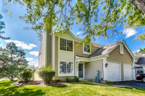 a view of a house with swimming pool