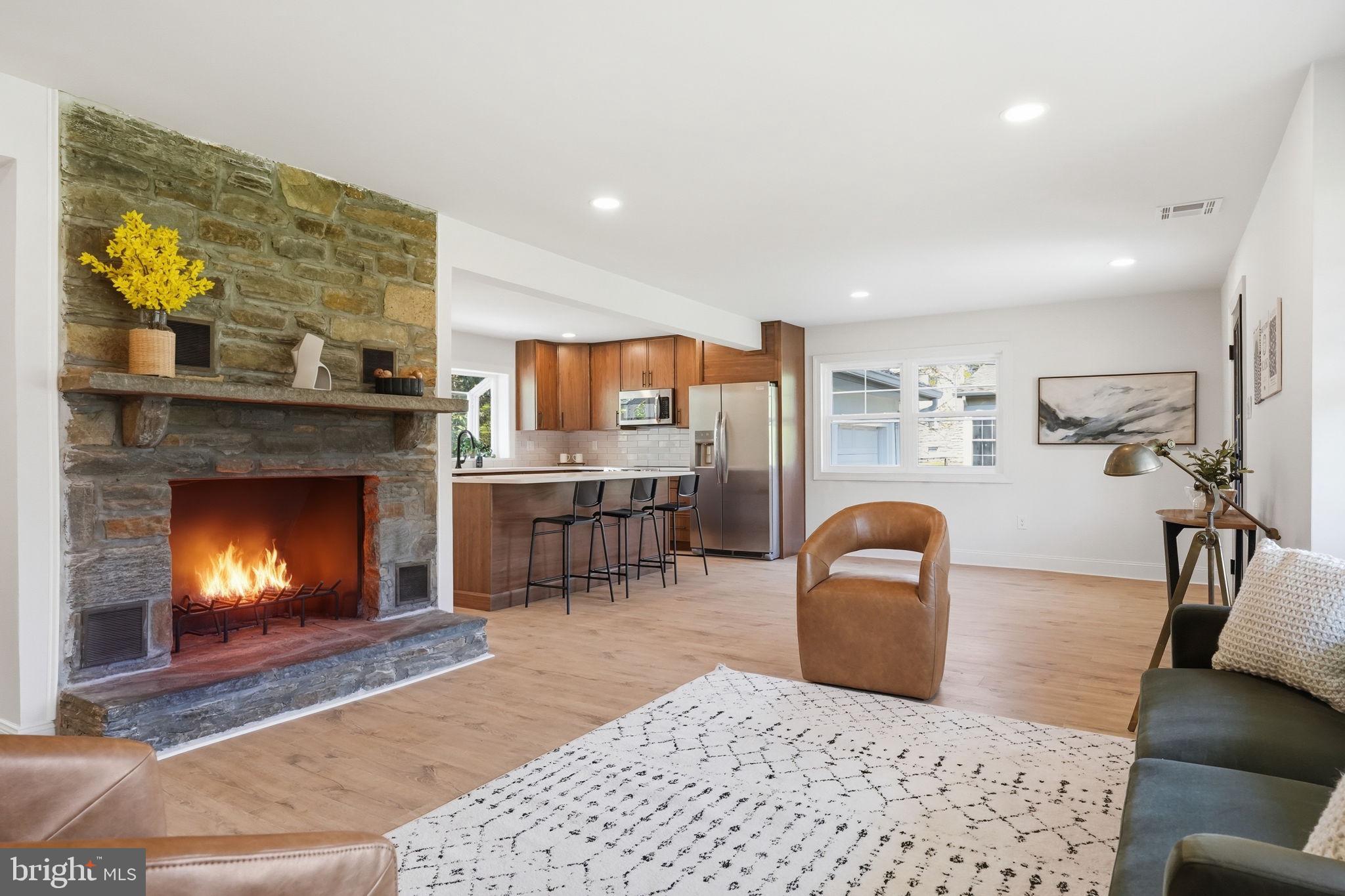 409 South Providence Road Wallingford, PA 19086 - Photo 18 of 106 Cozy living space with a warm fireplace.