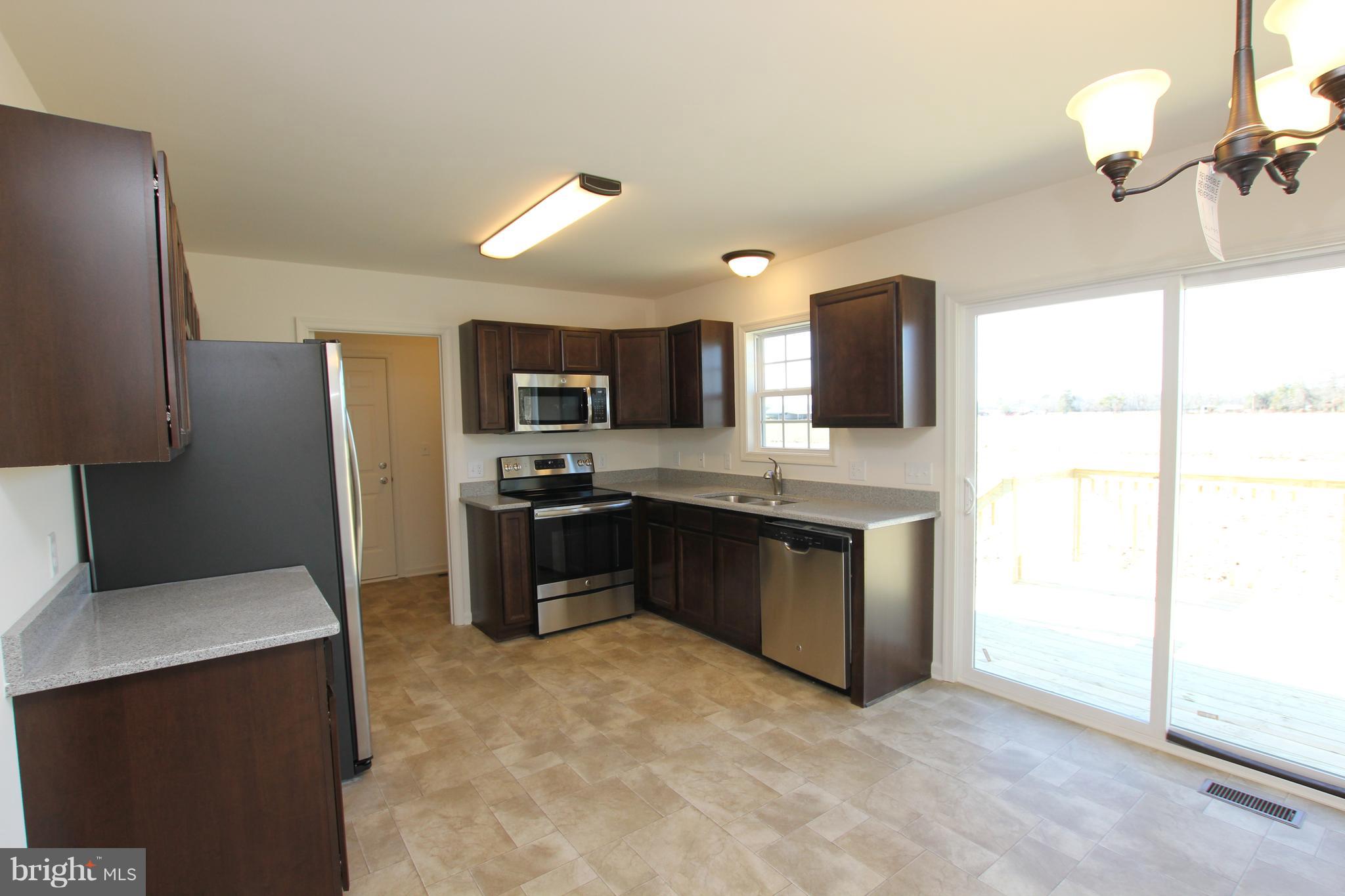 6998 Sharptown Road Laurel, DE 19956 - Photo 6 of 22 *Picture of similar model w/upgraded appliances.