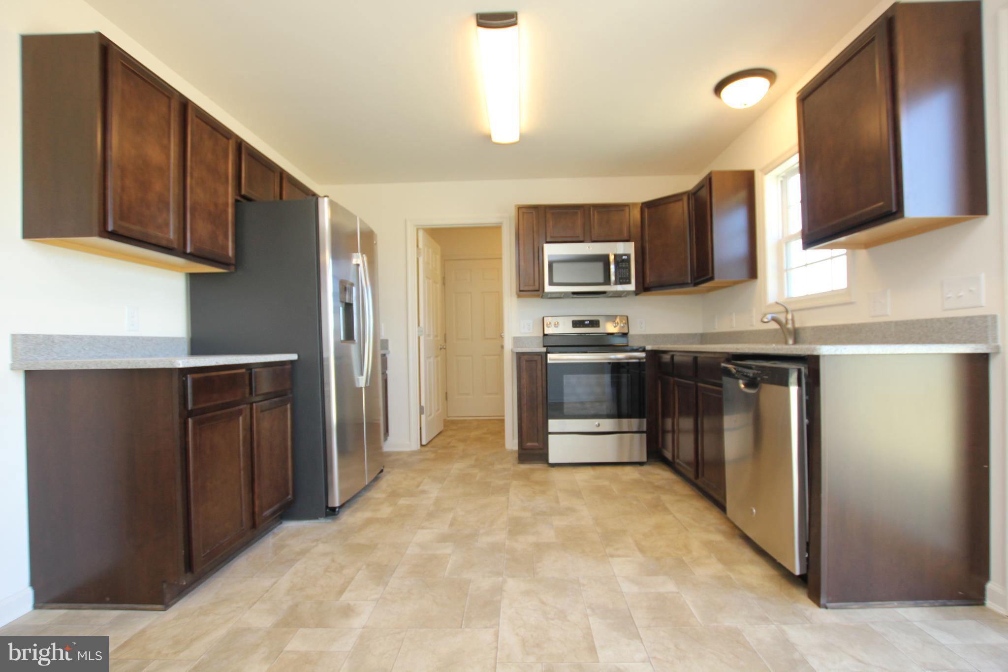 6998 Sharptown Road Laurel, DE 19956 - Photo 8 of 22 *Picture of similar model w/upgraded appliances.