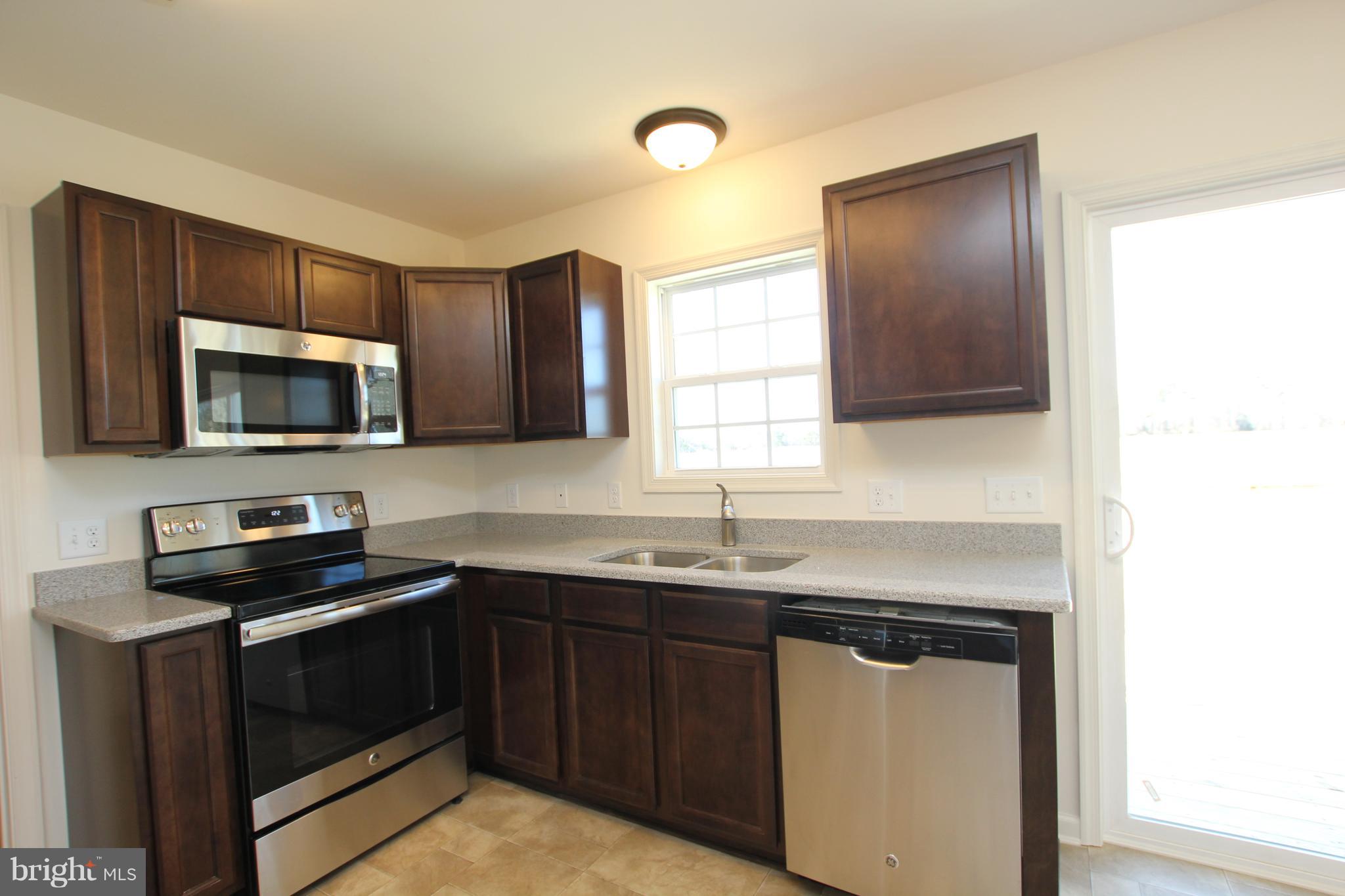 6998 Sharptown Road Laurel, DE 19956 - Photo 10 of 22 *Picture of similar model w/upgraded appliances.