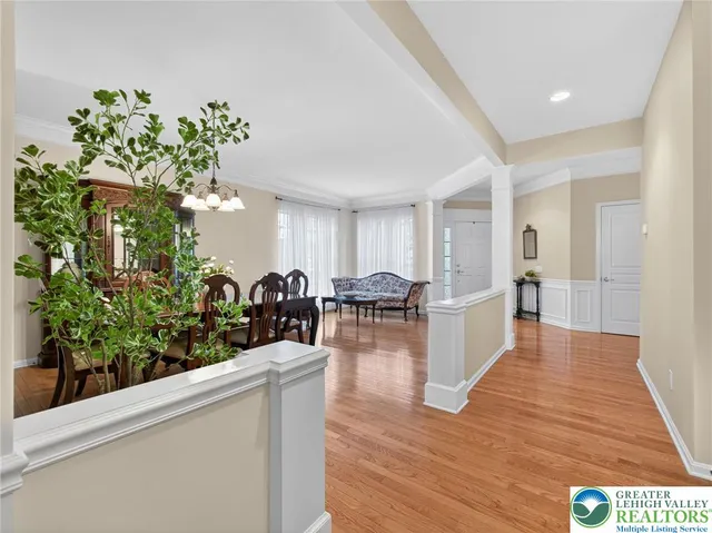 a view of a living room and entryway