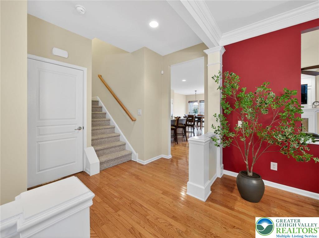 8611 Cascade Road Breinigsville, PA 18031 - Photo 14 of 40 a view of a living room with furniture and flowers