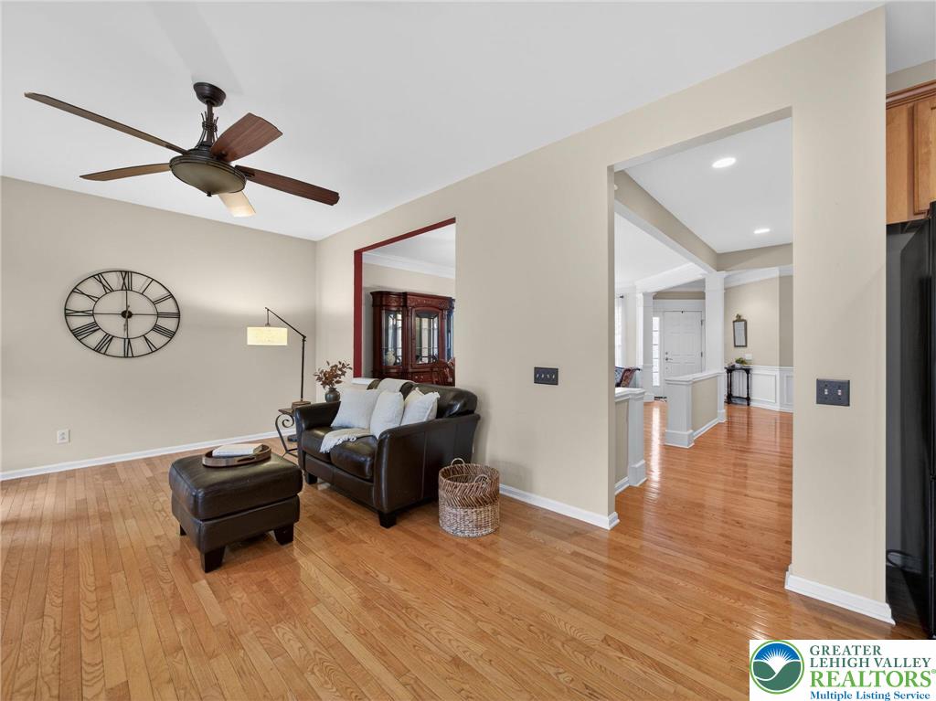 8611 Cascade Road Breinigsville, PA 18031 - Photo 16 of 40 a living room with furniture and a wooden floor