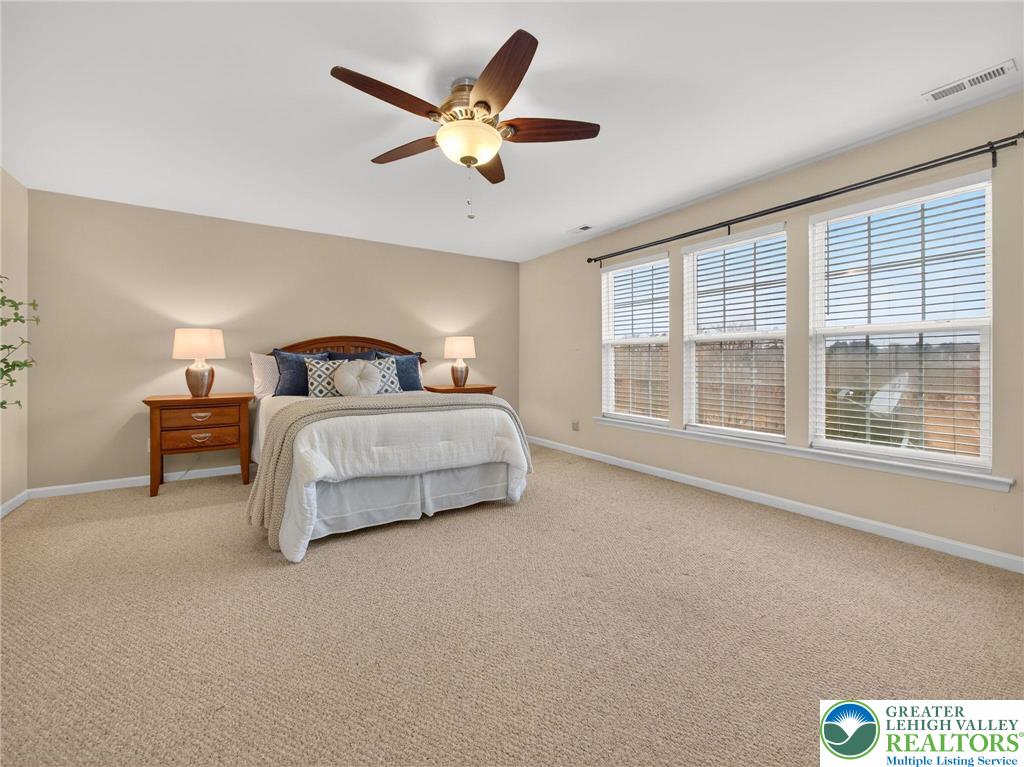 8611 Cascade Road Breinigsville, PA 18031 - Photo 28 of 40 a bedroom with bed and window