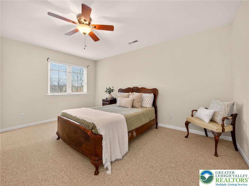 8611 Cascade Road Breinigsville, PA 18031 - Photo 34 of 40 a bedroom with a bed and a window