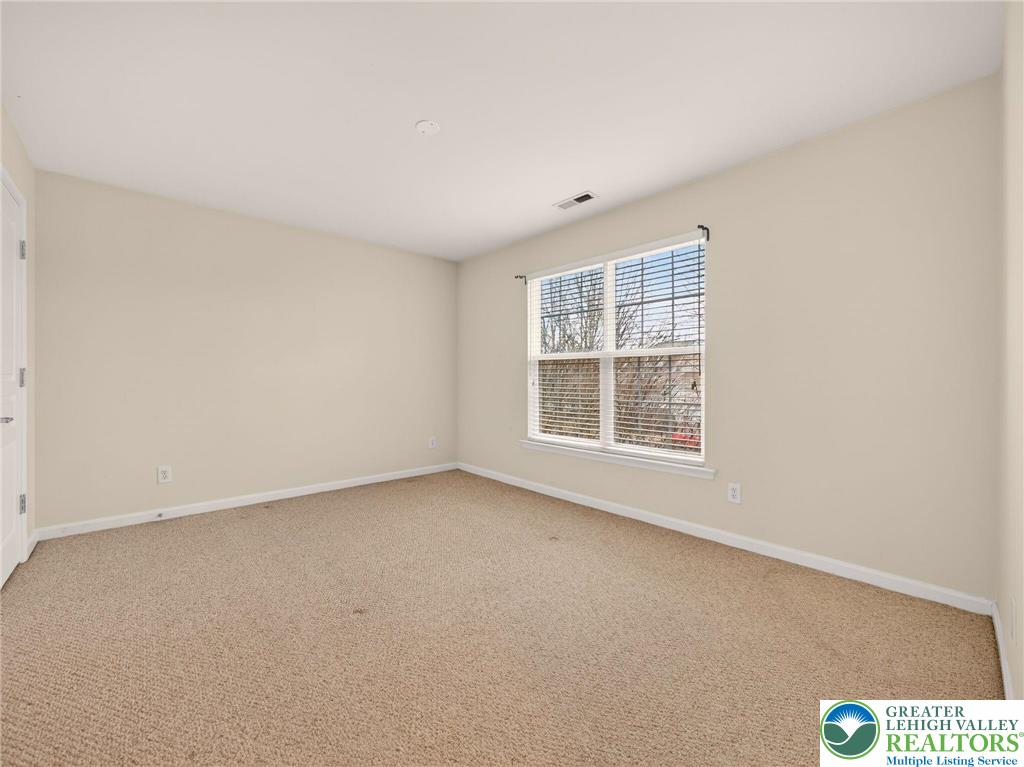 8611 Cascade Road Breinigsville, PA 18031 - Photo 36 of 40 an empty room with a window