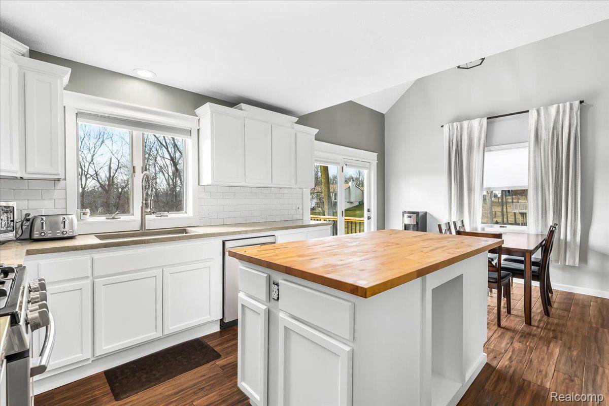 547 Glenwyth Road Brighton, MI 48116 - Photo 12 of 42 Kitchen prep area has timeless cement counter tops