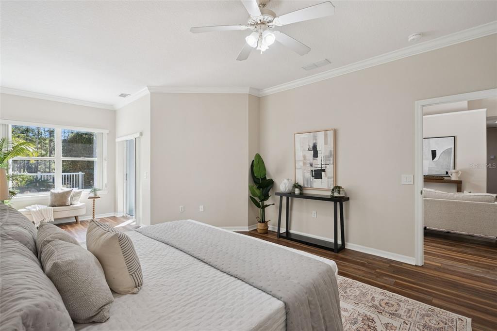 3441 Hickory Creek Road Deltona, FL 32738 - Photo 14 of 62 a bedroom with furniture and a window