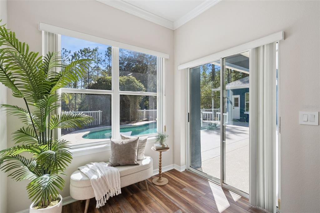 3441 Hickory Creek Road Deltona, FL 32738 - Photo 16 of 62 a living room with furniture and a potted plant