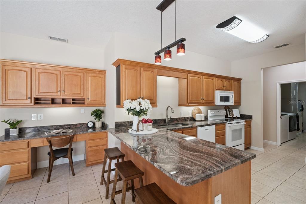 3441 Hickory Creek Road Deltona, FL 32738 - Photo 23 of 62 a very nice looking kitchen with a counter space