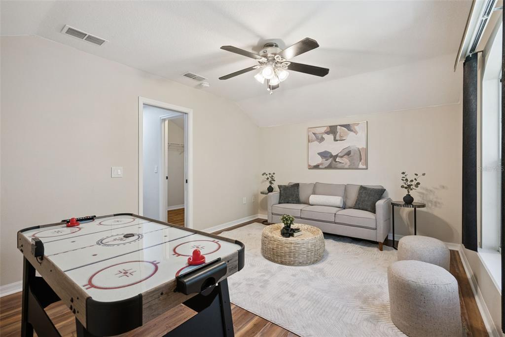 3441 Hickory Creek Road Deltona, FL 32738 - Photo 33 of 62 a living room with furniture and view