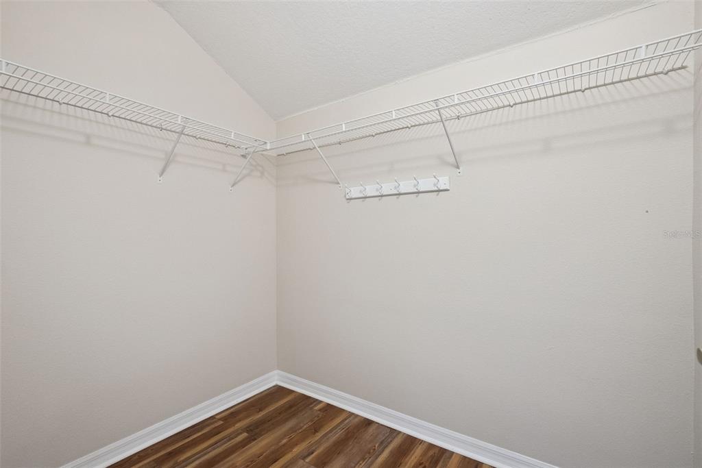 3441 Hickory Creek Road Deltona, FL 32738 - Photo 35 of 62 a view of a room with racks on the wall