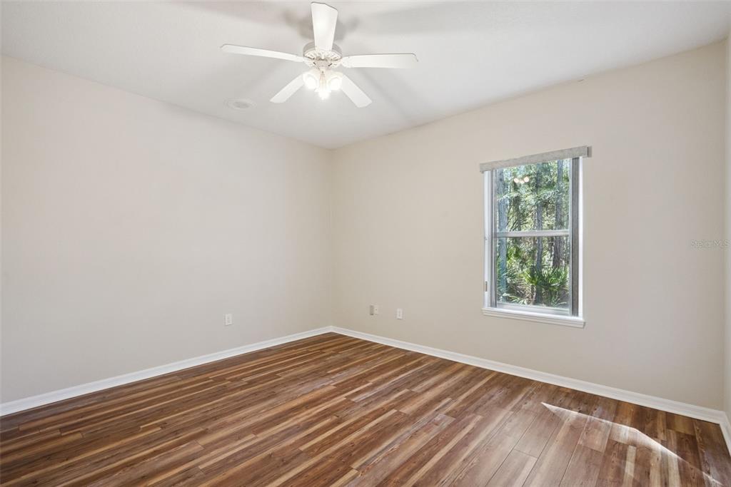 3441 Hickory Creek Road Deltona, FL 32738 - Photo 37 of 62 an empty room with a window