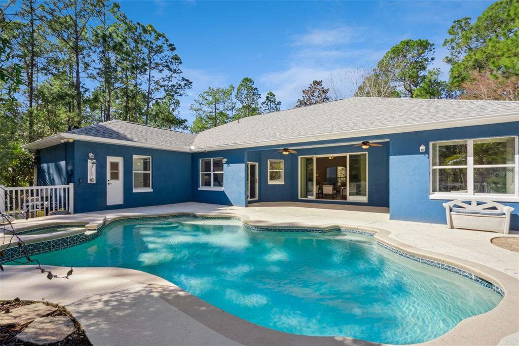 3441 Hickory Creek Road Deltona, FL 32738 - Photo 43 of 62 front view of a house with a yard