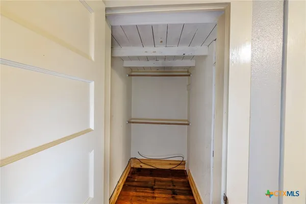 a view of an entryway with a hallway