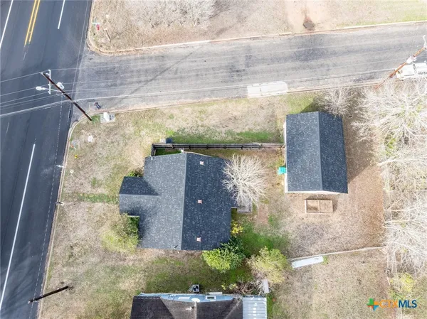 a view of a yard from a balcony