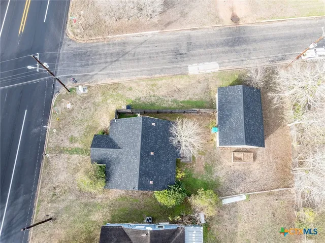 a view of a yard from a balcony