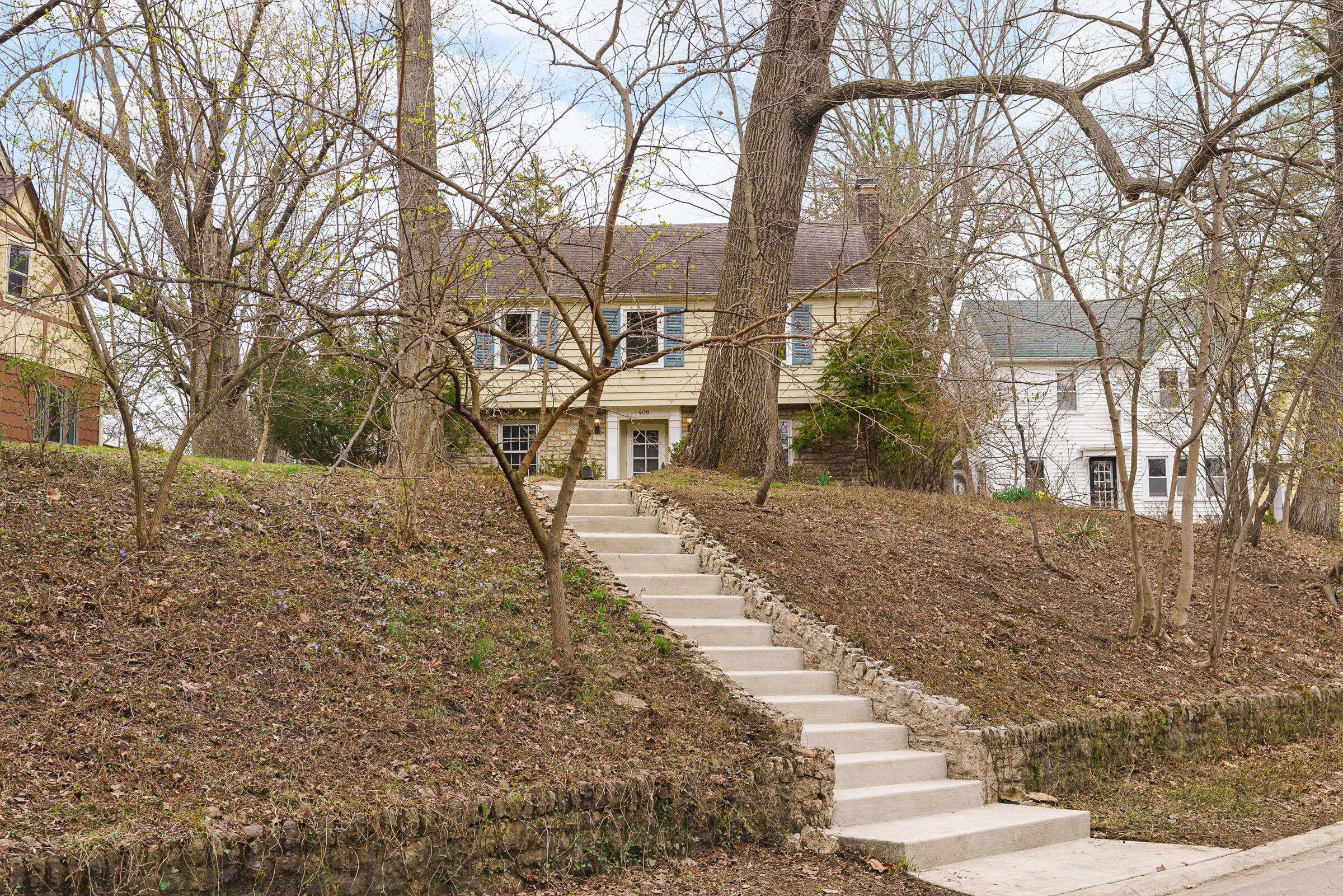 408 Midgard Road Columbus, OH 43202 - Photo 32 of 46 View from the street showcase the updated concrete steps to the ravine