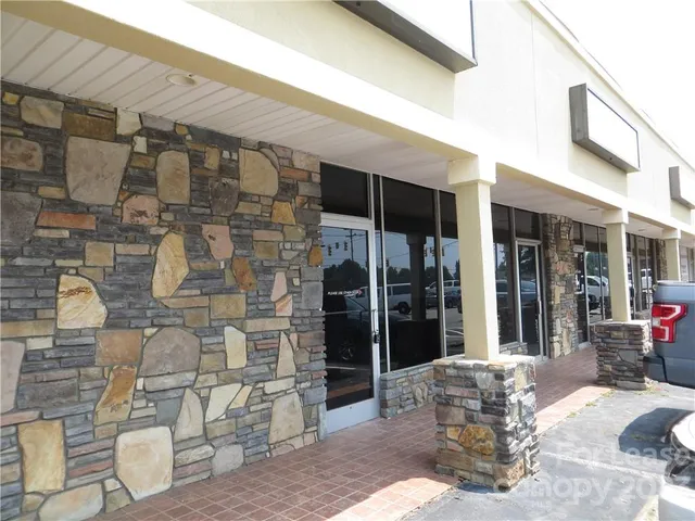 a front view of a building with door