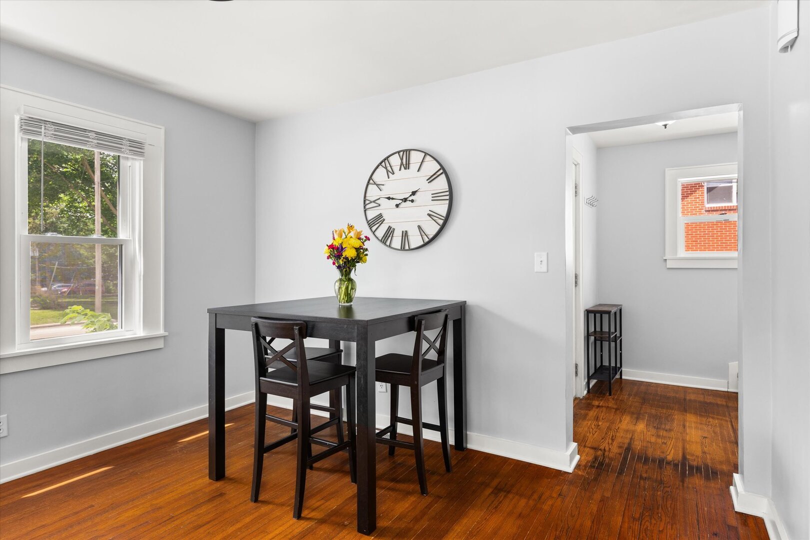 742 Chambers Street Ottawa, IL 61350 - Photo 8 of 39 a view of a dining room with furniture window and wooden floor