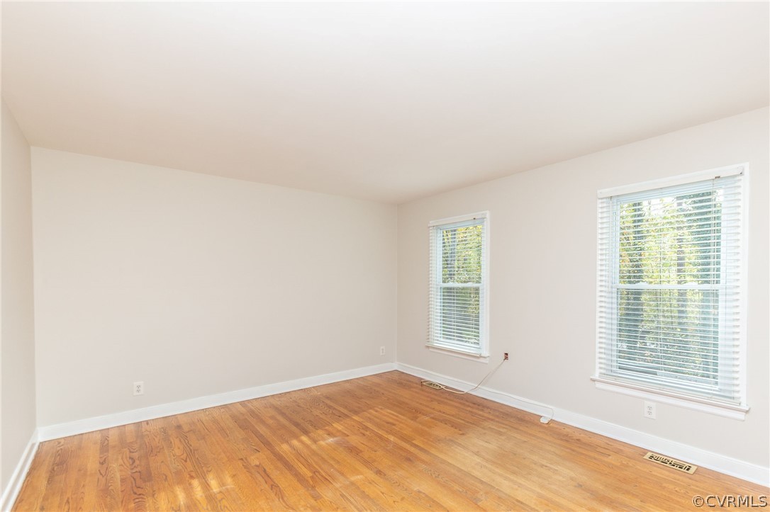 14301 Huntgate Woods Road Midlothian, VA 23112 - Photo 22 of 34 a view of an empty room with a window