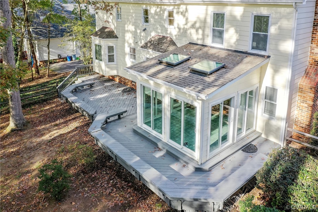 14301 Huntgate Woods Road Midlothian, VA 23112 - Photo 5 of 34 a view of a balcony with chairs and wooden floor