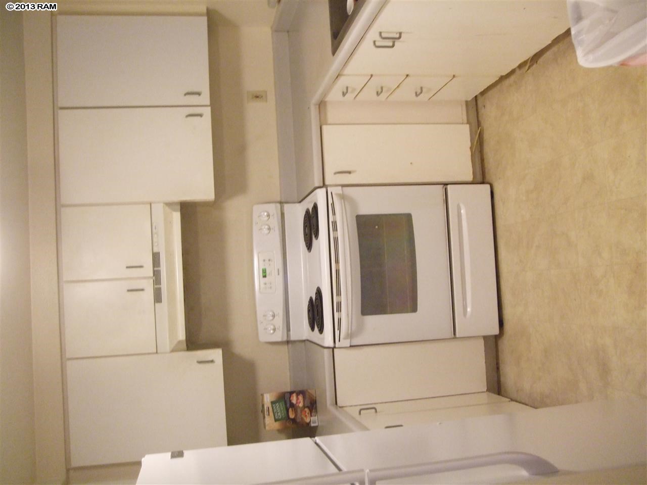 2747 South Kihei Road, Unit F106 Kihei, HI 96753 - Photo 3 of 6 a bathroom with a mirror and a shower