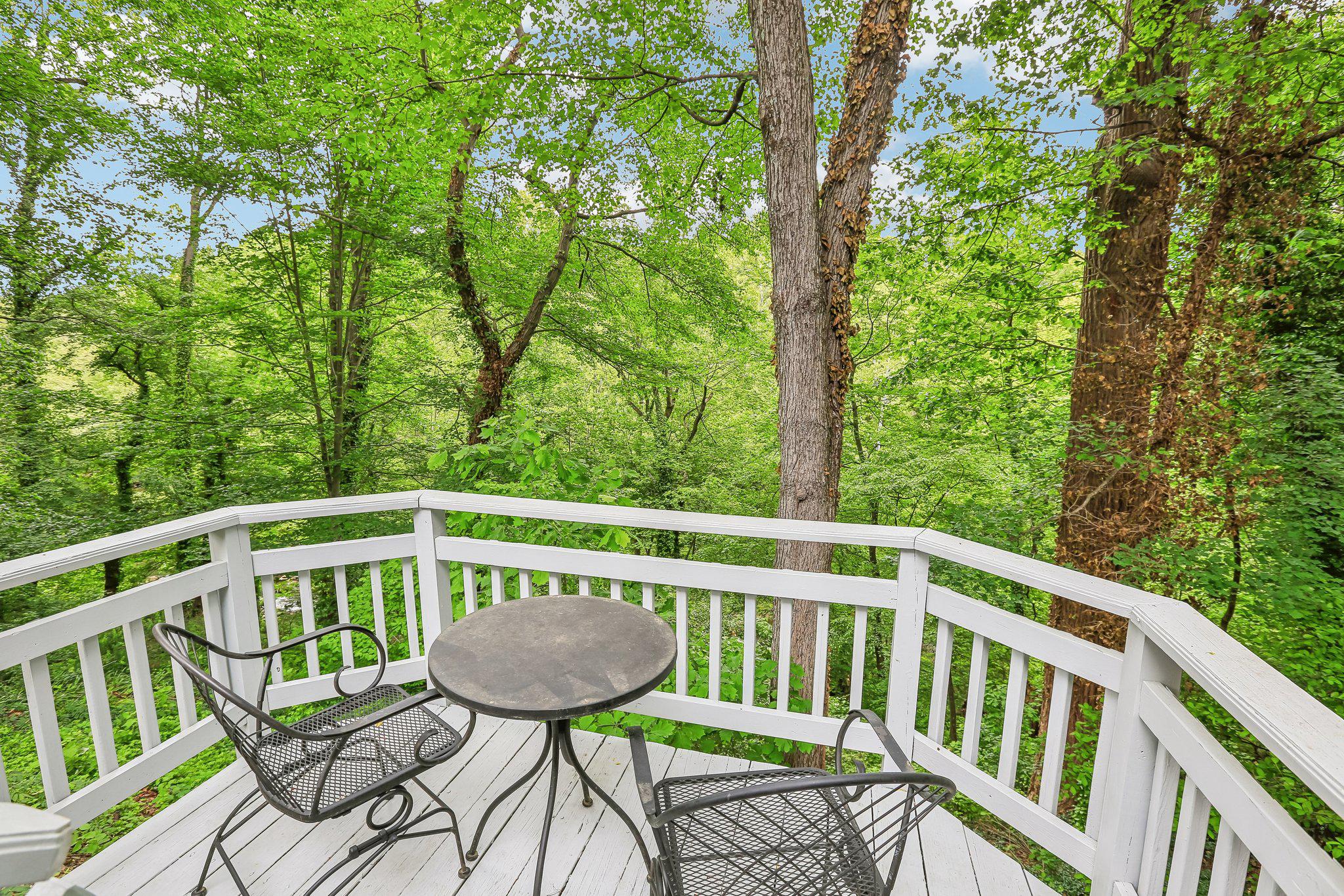 221 Patuxent Road Laurel, MD 20707 - Photo 30 of 33 Serene deck nestled in lush greenery.