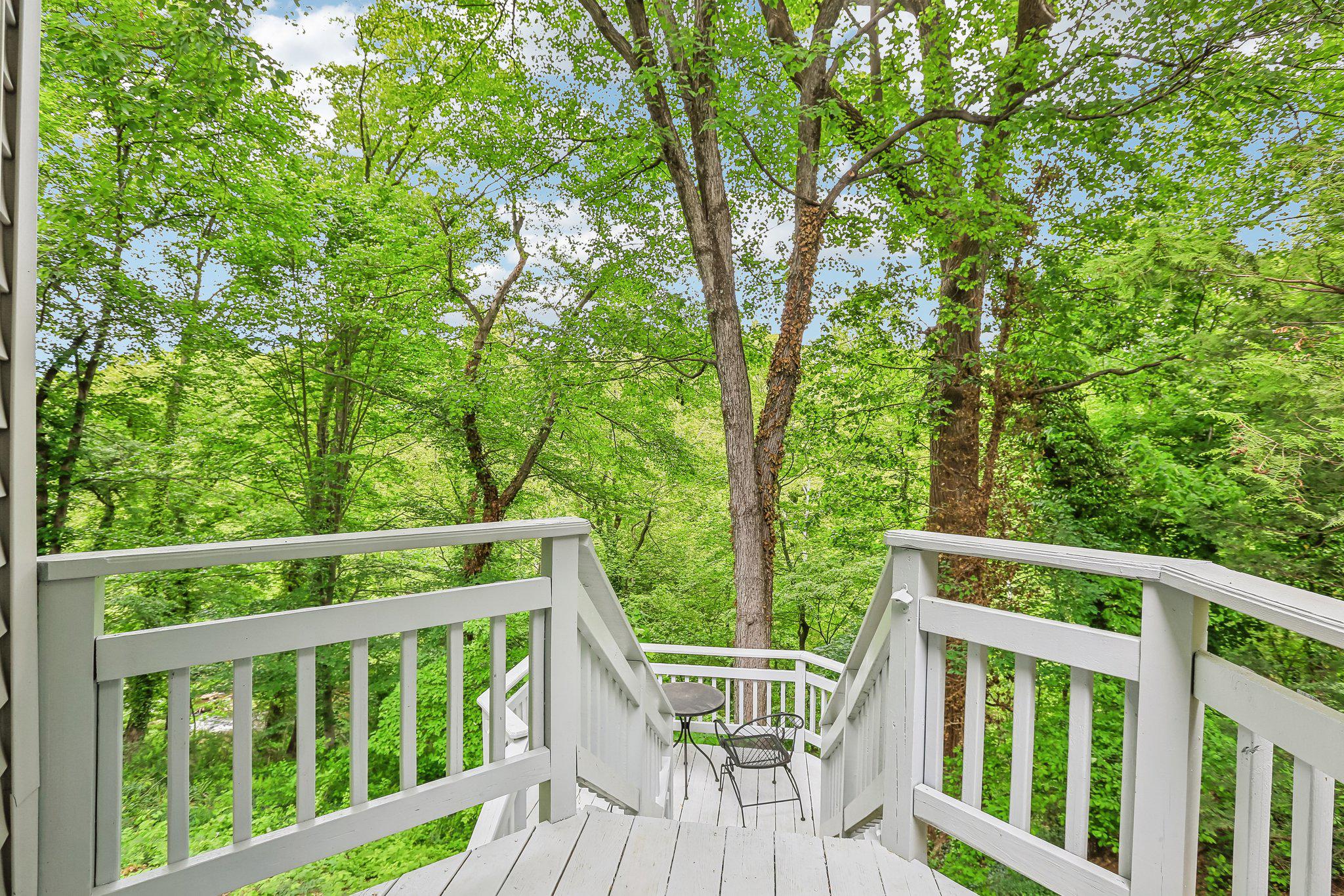 221 Patuxent Road Laurel, MD 20707 - Photo 31 of 33 Serene deck overlooking lush greenery.
