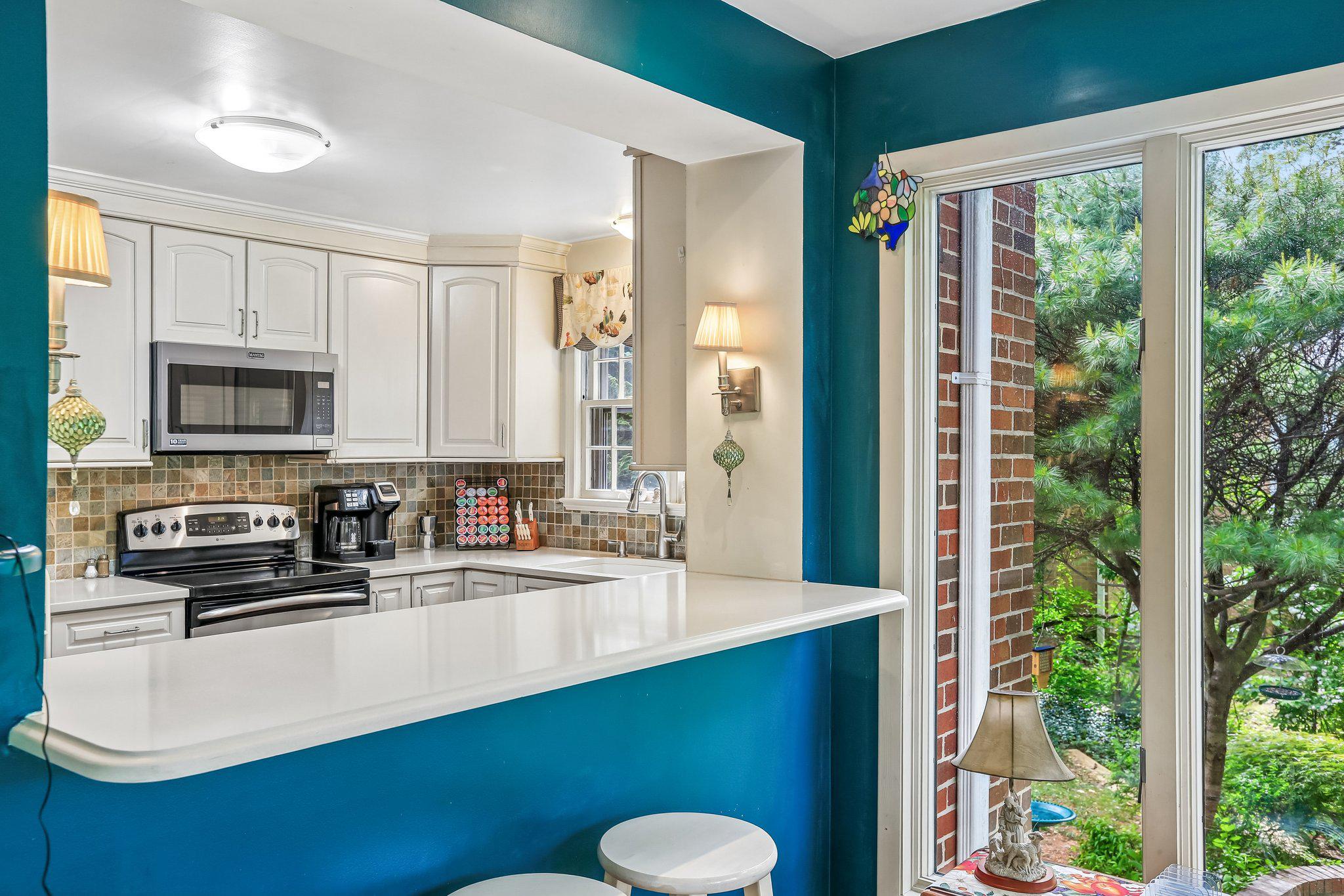 221 Patuxent Road Laurel, MD 20707 - Photo 10 of 33 Bright kitchen with garden views.