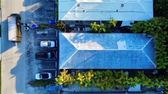 a view of a wooden door with an outdoor seating