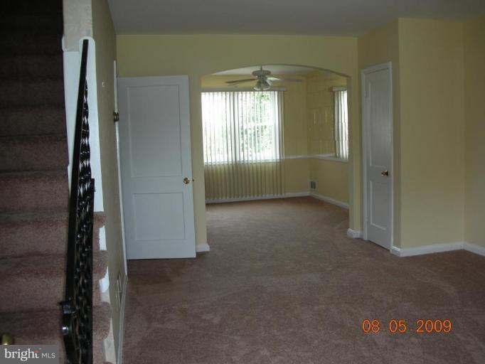 3443 Dunran Road Dundalk, MD 21222 - Photo 2 of 29 an empty room with windows