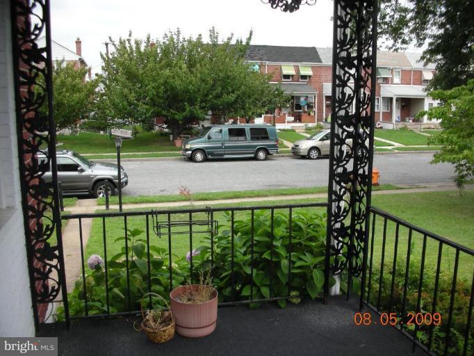 3443 Dunran Road Dundalk, MD 21222 - Photo 16 of 29 a view of a street with sitting area and garden