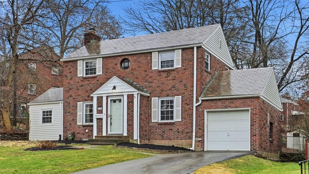 2339 Collins Road Pittsburgh, PA 15235 - Photo 2 of 24 front view of a house with a yard