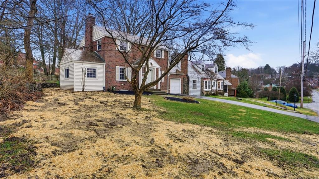 2339 Collins Road Pittsburgh, PA 15235 - Photo 3 of 24 a front view of house with yard and trees