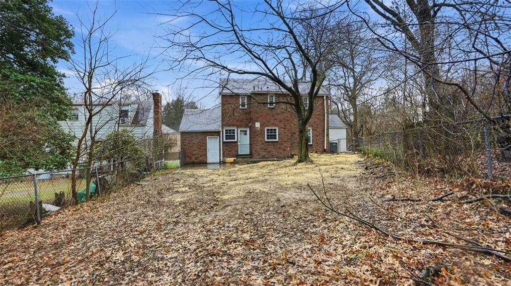 2339 Collins Road Pittsburgh, PA 15235 - Photo 4 of 24 a view of a house with a yard and large tree