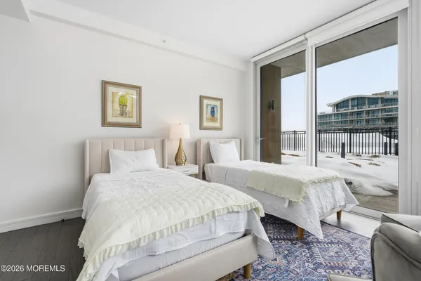 a bathroom with a mirror and a shower