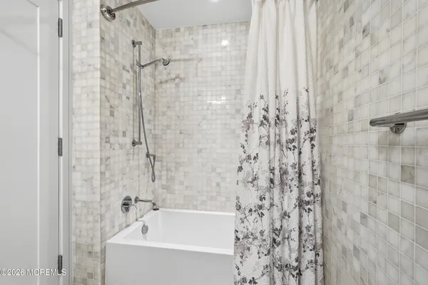 a house with a bench in front of it