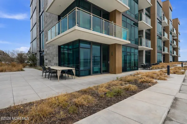a view of a chairs and table in the terrace