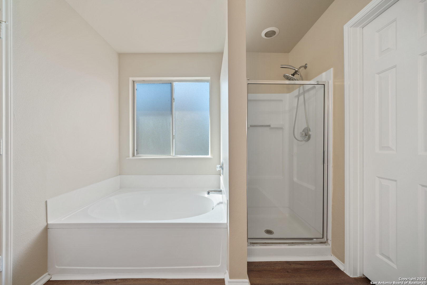 144 Crest Bluff Cibolo, TX 78108 - Photo 22 of 30 a bathroom with a bathtub and a shower