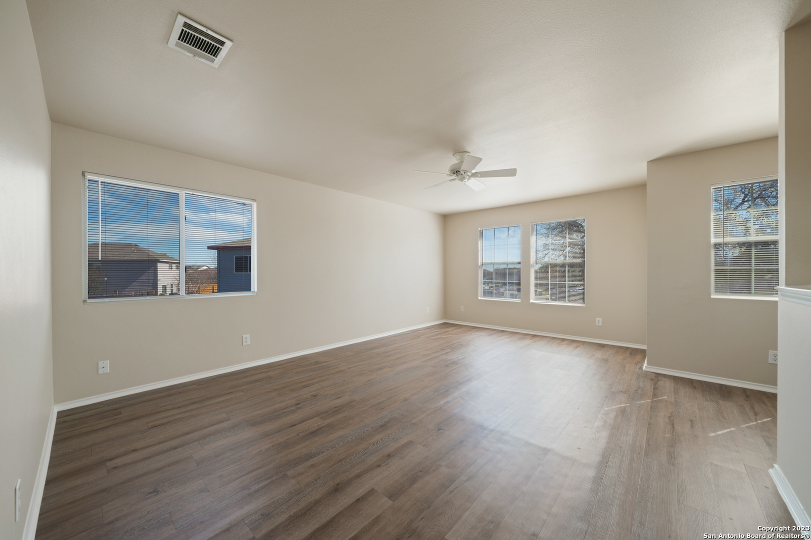 144 Crest Bluff Cibolo, TX 78108 - Photo 26 of 30 wooden floor in an empty room with a window