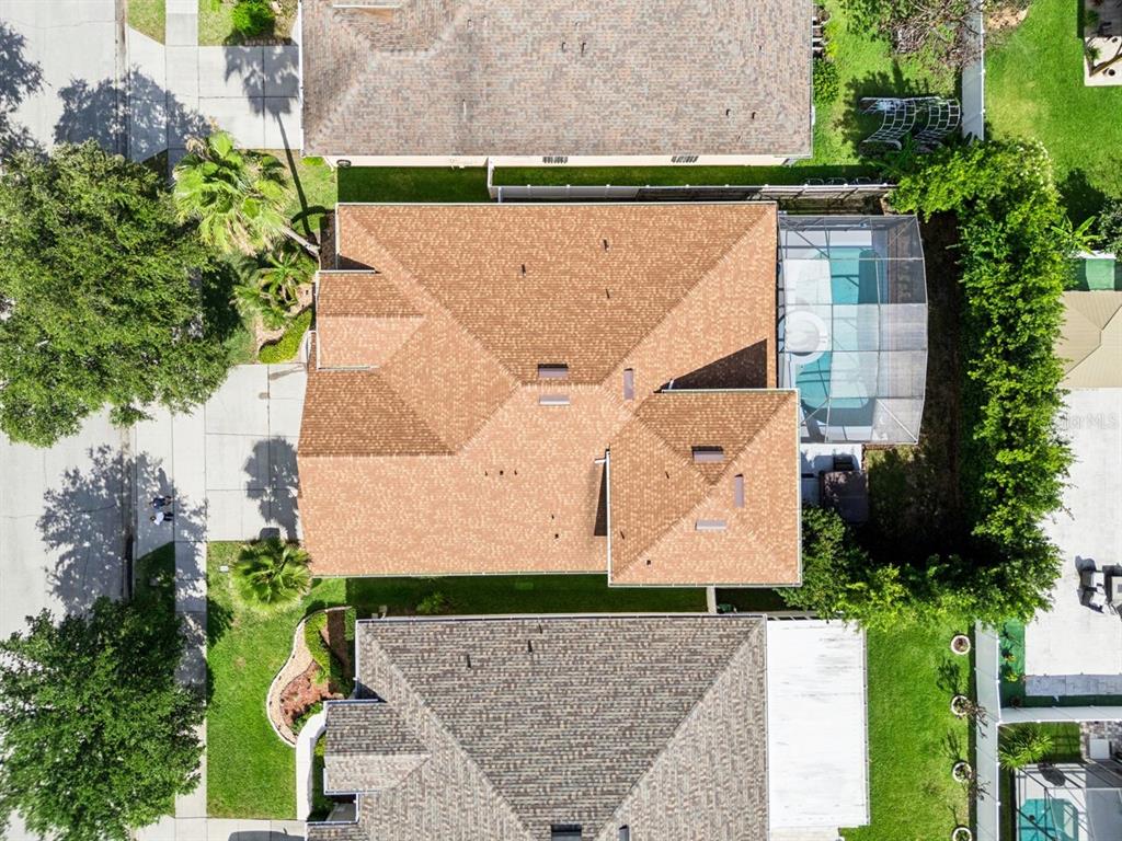 8484 Dover View Lane Orlando, FL 32829 - Photo 30 of 41 an aerial view of a house with a yard and a large tree