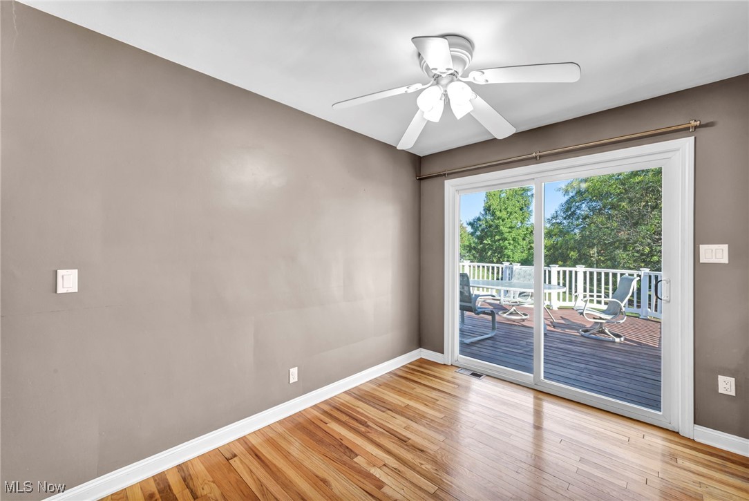 4523 Oakes Road Brecksville, OH 44141 - Photo 16 of 50 Spare room featuring light wood-style floors and a ceiling fan