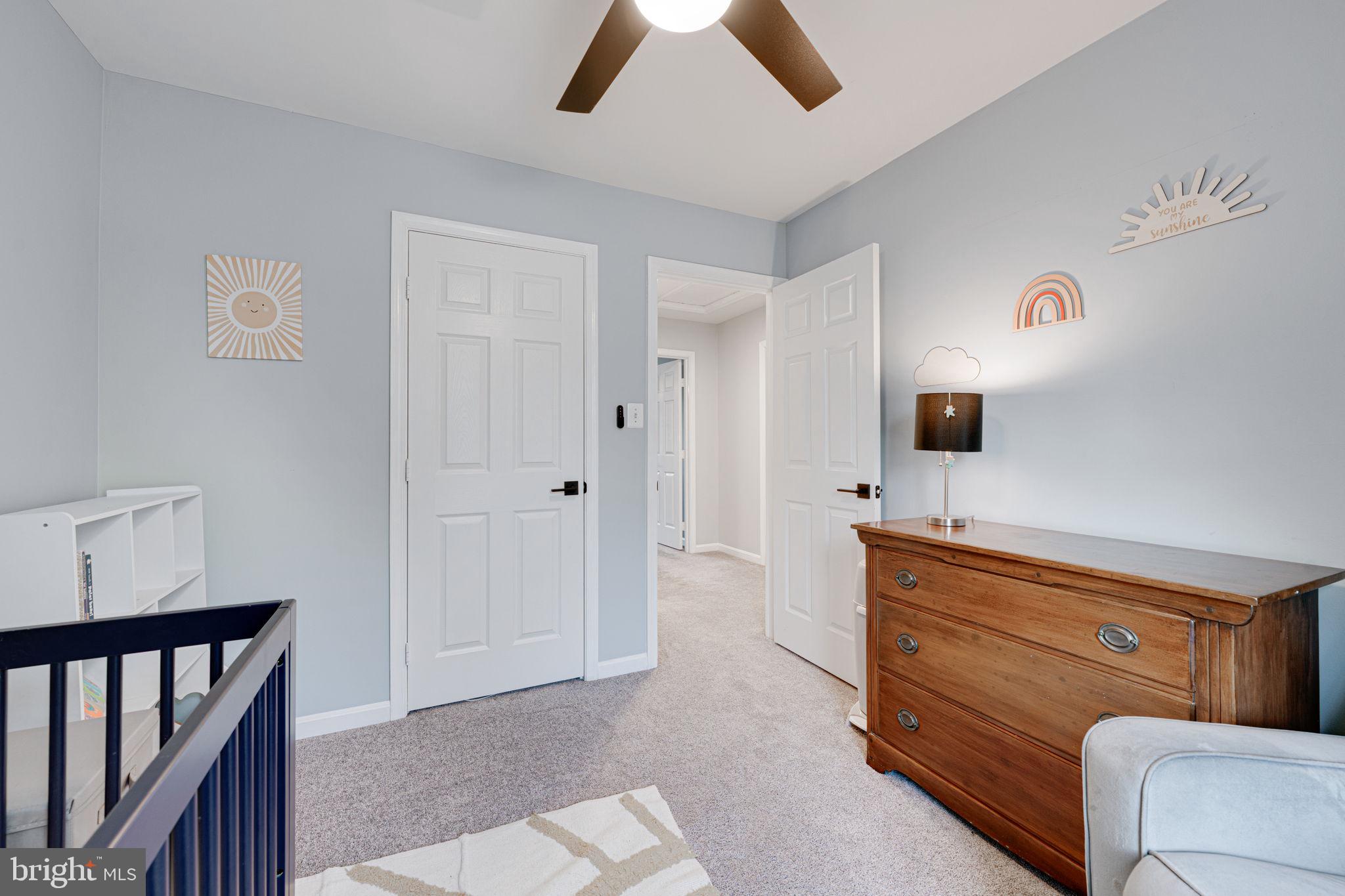 6911 Kerrywood Circle Centreville, VA 20121 - Photo 18 of 44 a living room with furniture and a flat screen tv