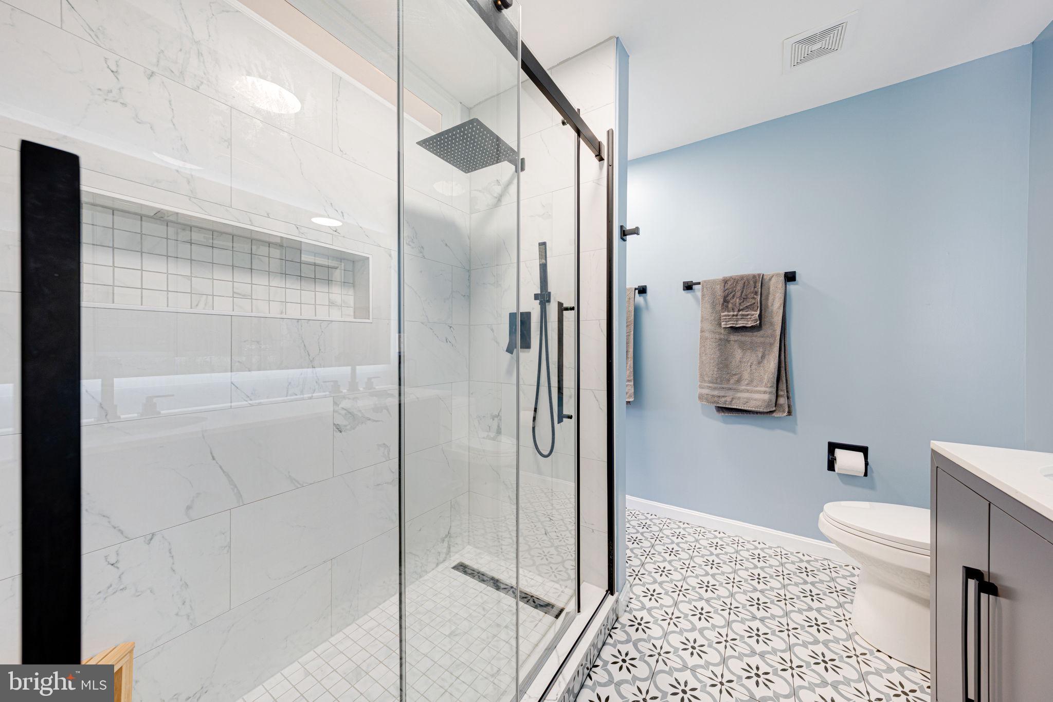 6911 Kerrywood Circle Centreville, VA 20121 - Photo 28 of 44 a bathroom with a shower and a toilet