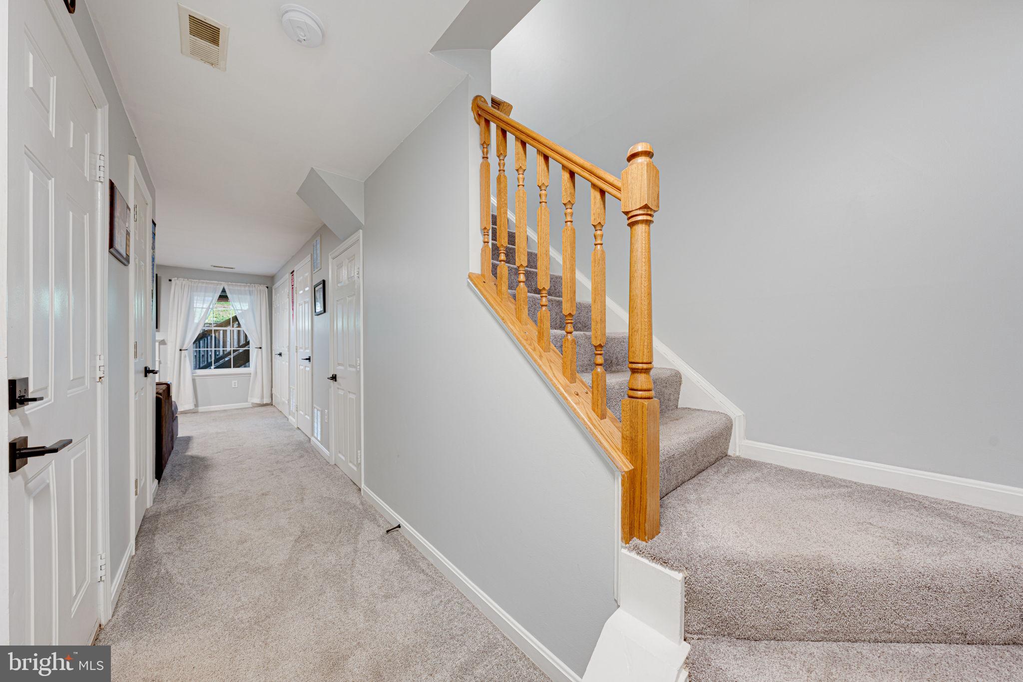 6911 Kerrywood Circle Centreville, VA 20121 - Photo 35 of 44 a view of a hallway with staircase