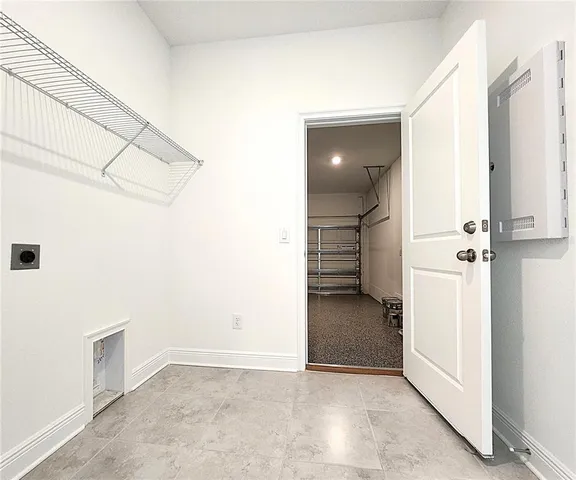 a view of a hallway with closet